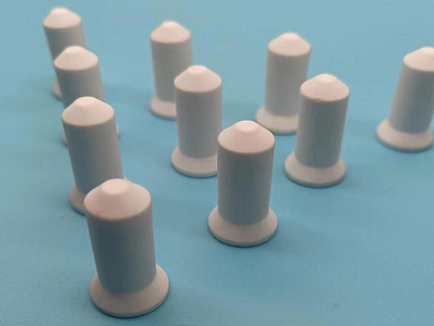 What is the general tolerance for ceramic dowel pin holes?